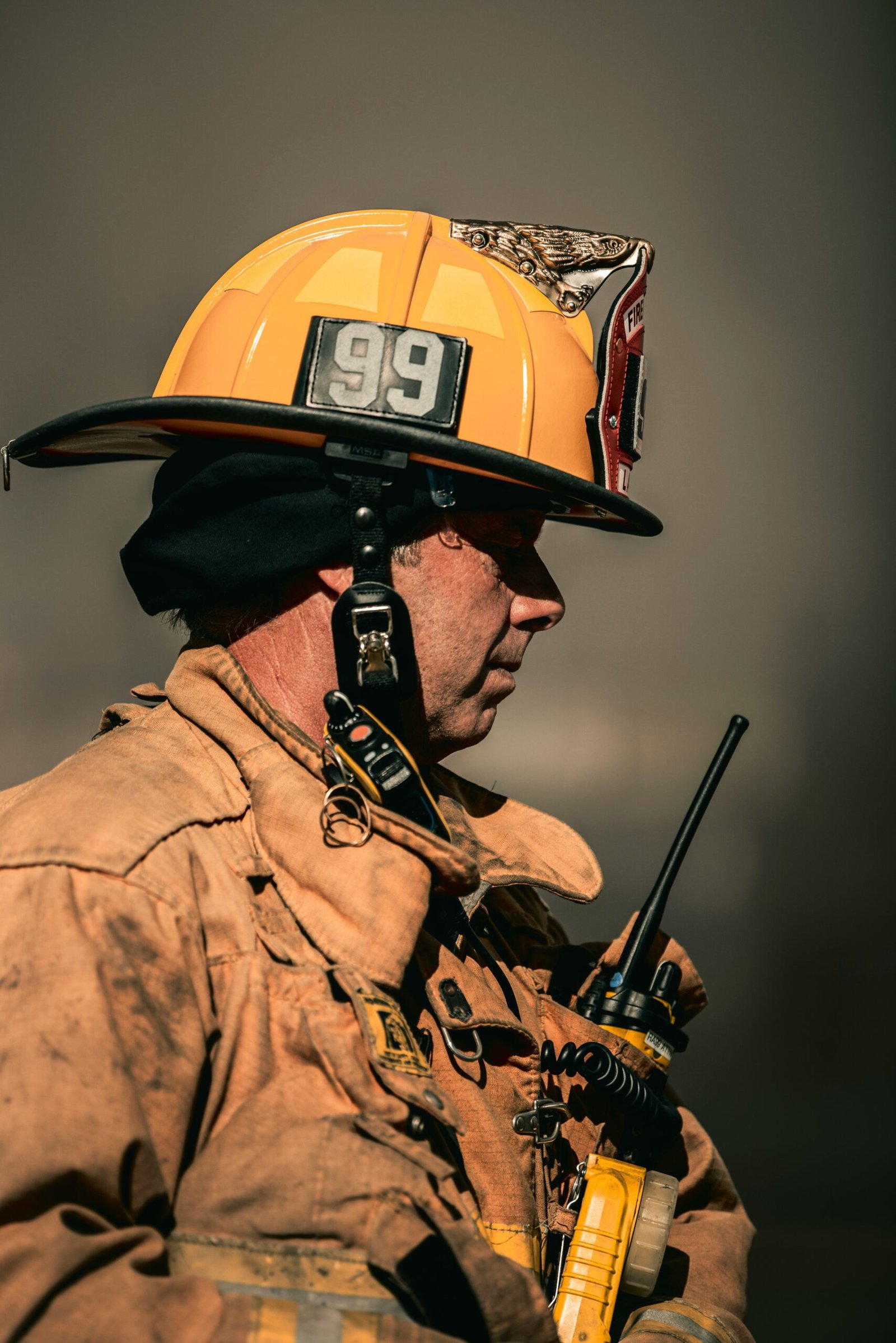satisfied client with fire fighter helmet